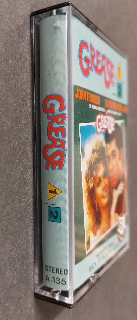 Grease CASSETTE John Travolta Oliva Newton John Indonesie, Cd's en Dvd's, Cassettebandjes, Gebruikt, Verzenden, 1 bandje, Voorbespeeld