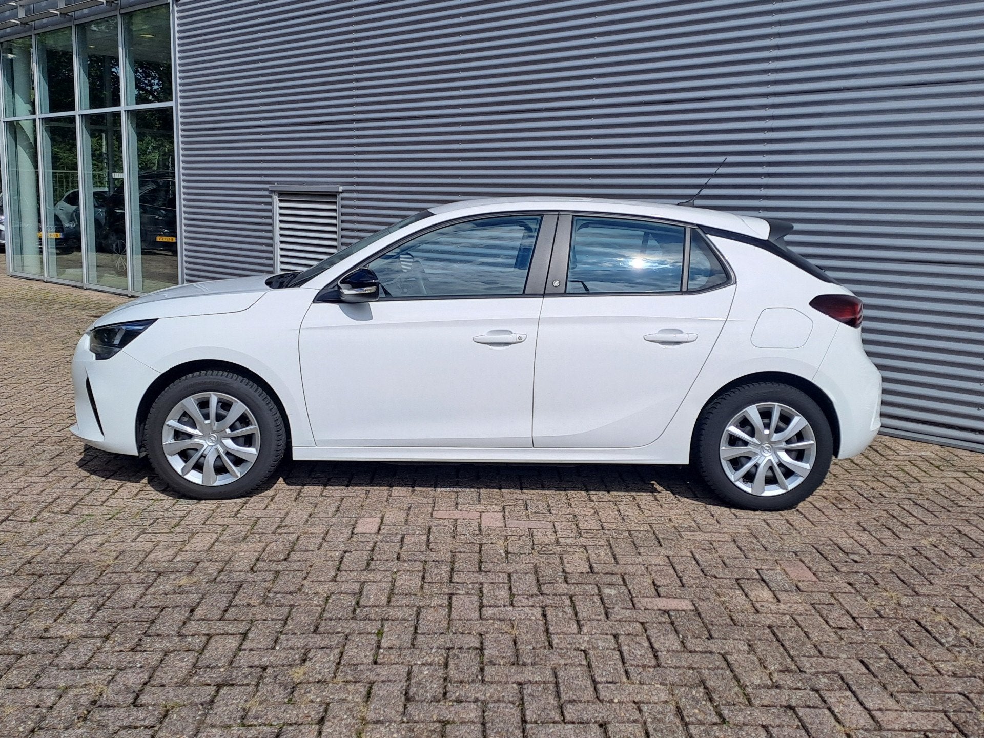 Opel CORSA-E Edition 50 kWh | Cruise control | Apple Carplay, Auto's, 12 maanden, Gebruikt, Wit, Origineel Nederlands