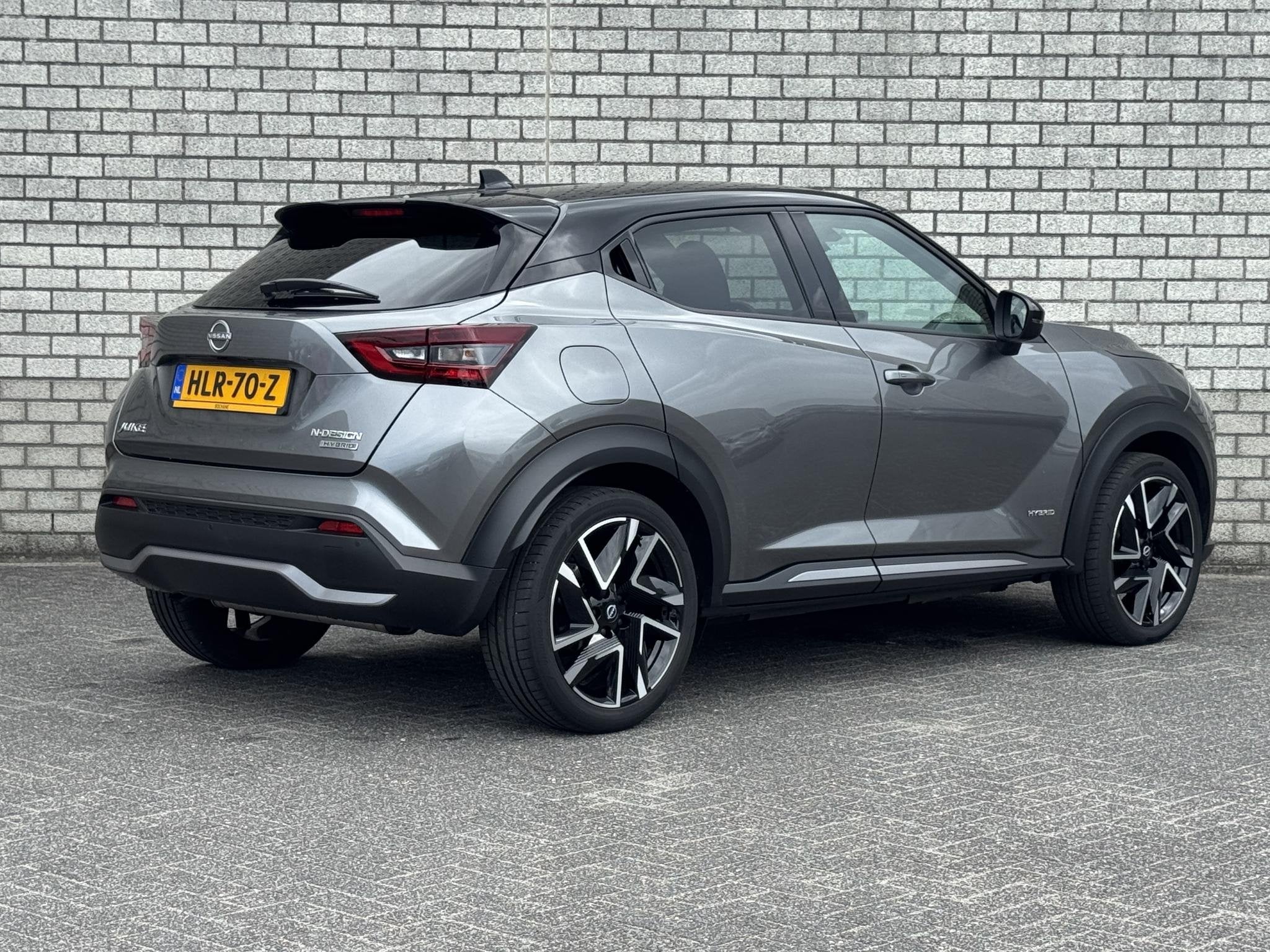 Nissan Juke 1.6 Hybrid N-Design | Navigatie | Achteruitrijca, Auto's, Stof, Gebruikt, Met garantie (alle), Bedrijf