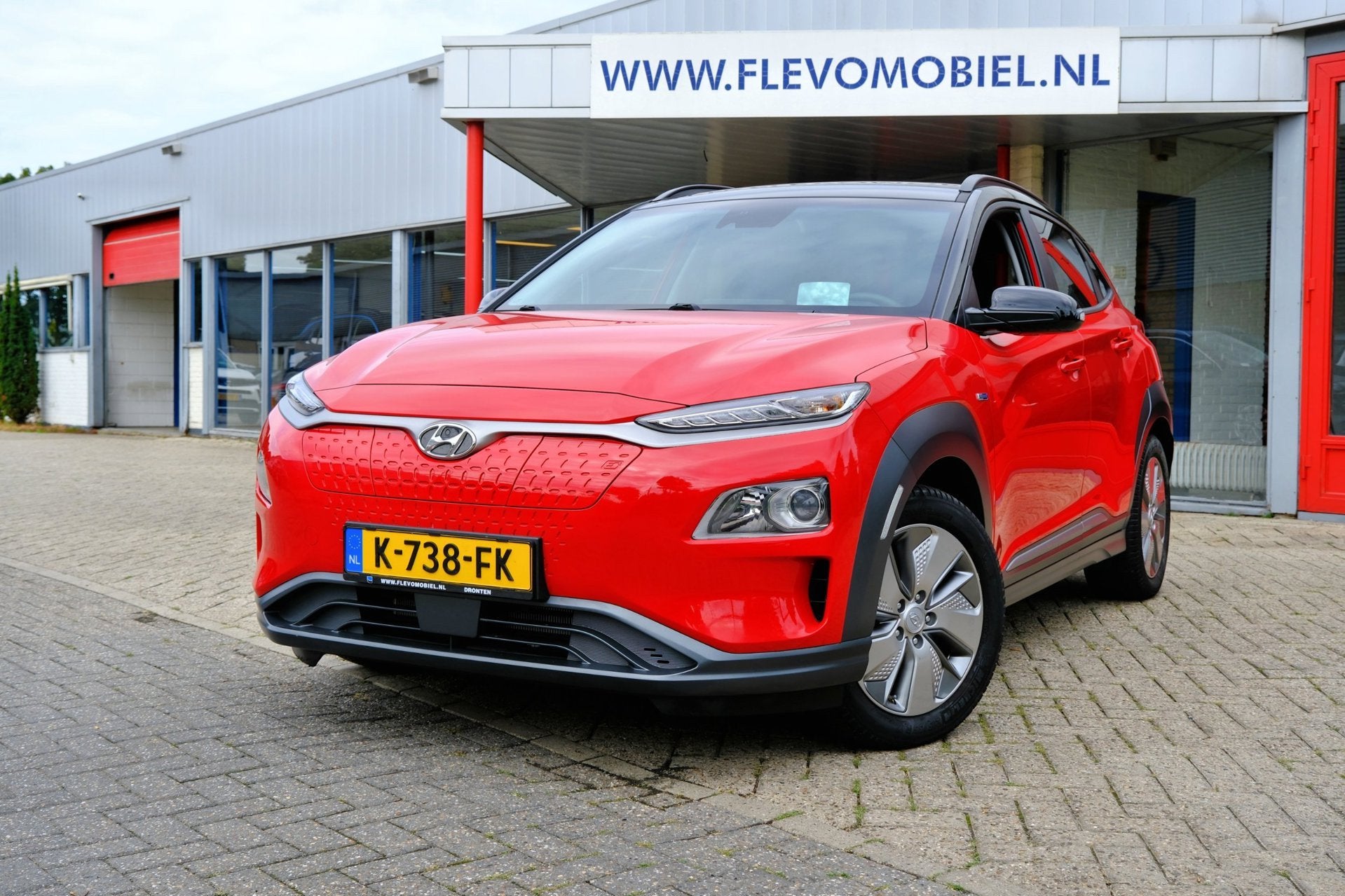 Hyundai Kona EV Fashion 64 kWh Aut. HUD|Navi|Cam|Adapt.Cruis, Stof, Gebruikt, 174 min, Automatische klimaatregeling