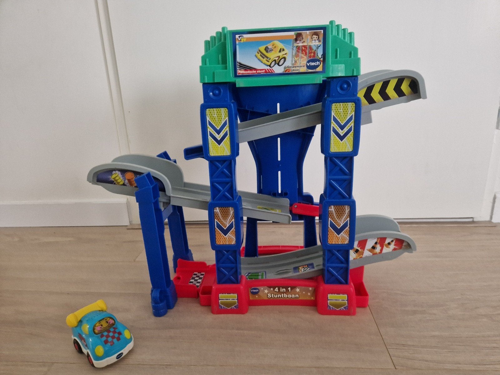 VTech Toet Toet Auto's 4-in-1 Stuntbaan met Raceauto, Kinderen en Baby's, Ophalen of Verzenden, Zo goed als nieuw, 2 tot 4 jaar