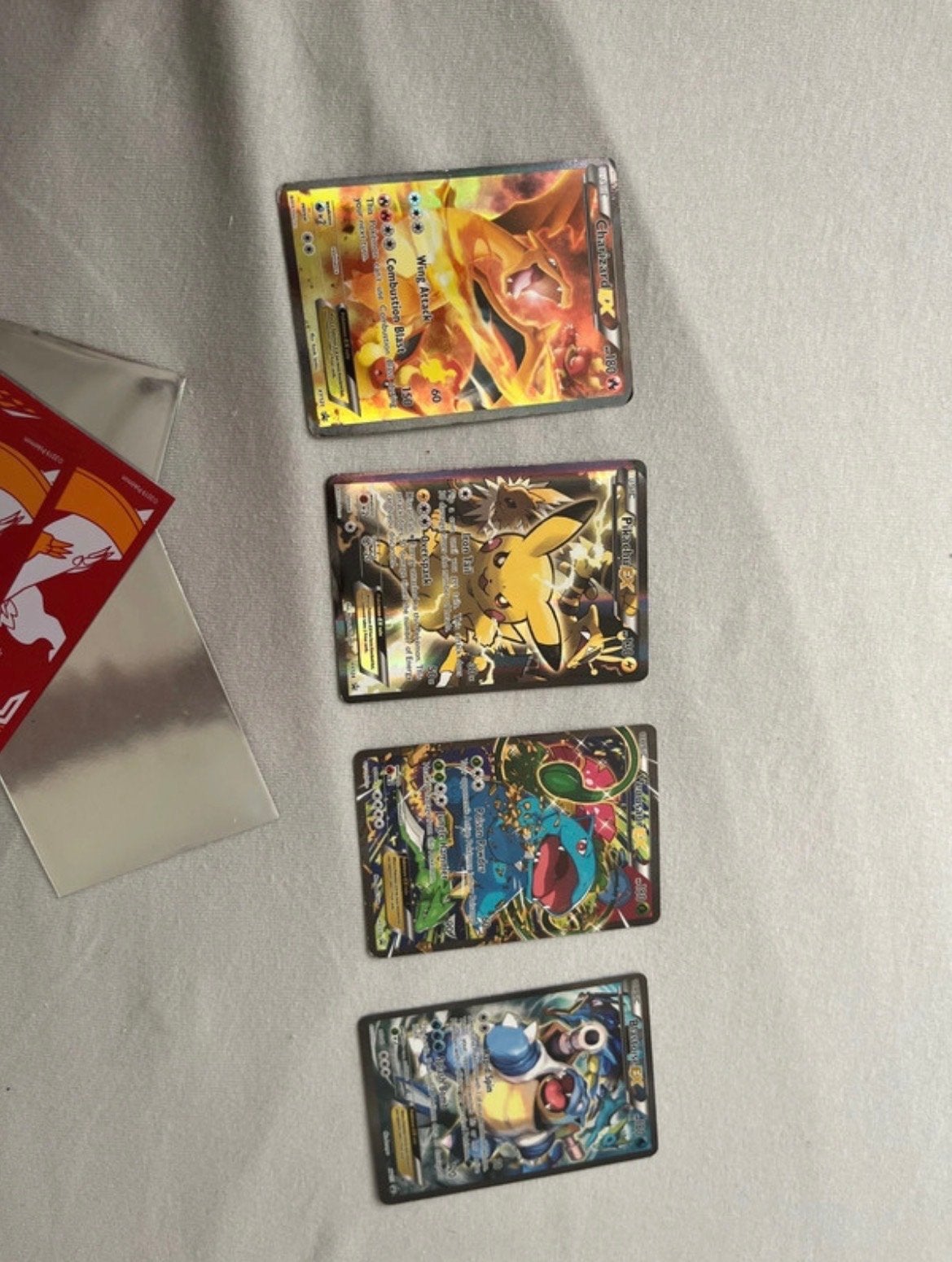 Pokémon EX promo’s: Charizard, Pikachu, Blastoise, venusaur, Ophalen of Verzenden, Zo goed als nieuw, Meerdere kaarten, Foil