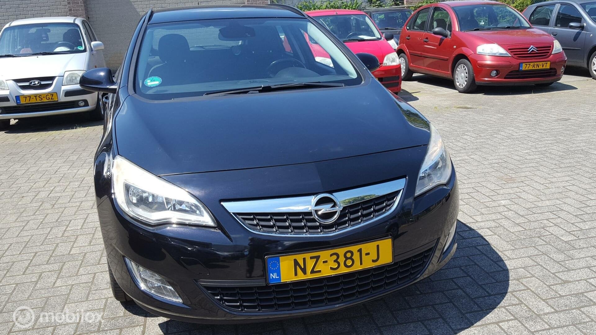 Opel Astra Sports Tourer 1.4 Turbo Edition, Airco, Voorwielaandrijving, Euro 5, Gebruikt, 4 cilinders