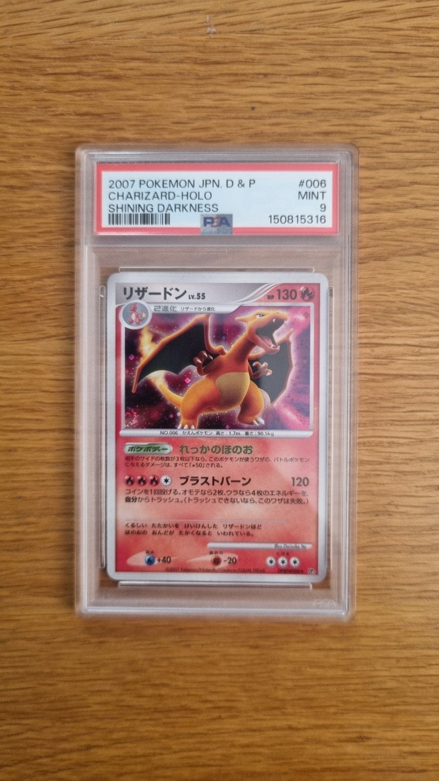 Charizard PSA 9 Shining Darkness Japanese Pokémon Holo, Ophalen of Verzenden, Zo goed als nieuw, Losse kaart