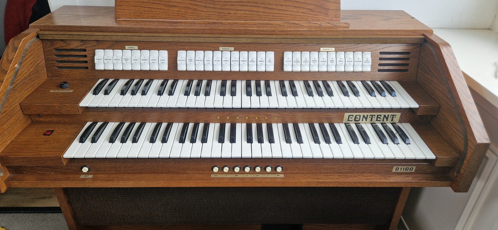 Content orgel, bruin, met twee klavieren, Ophalen