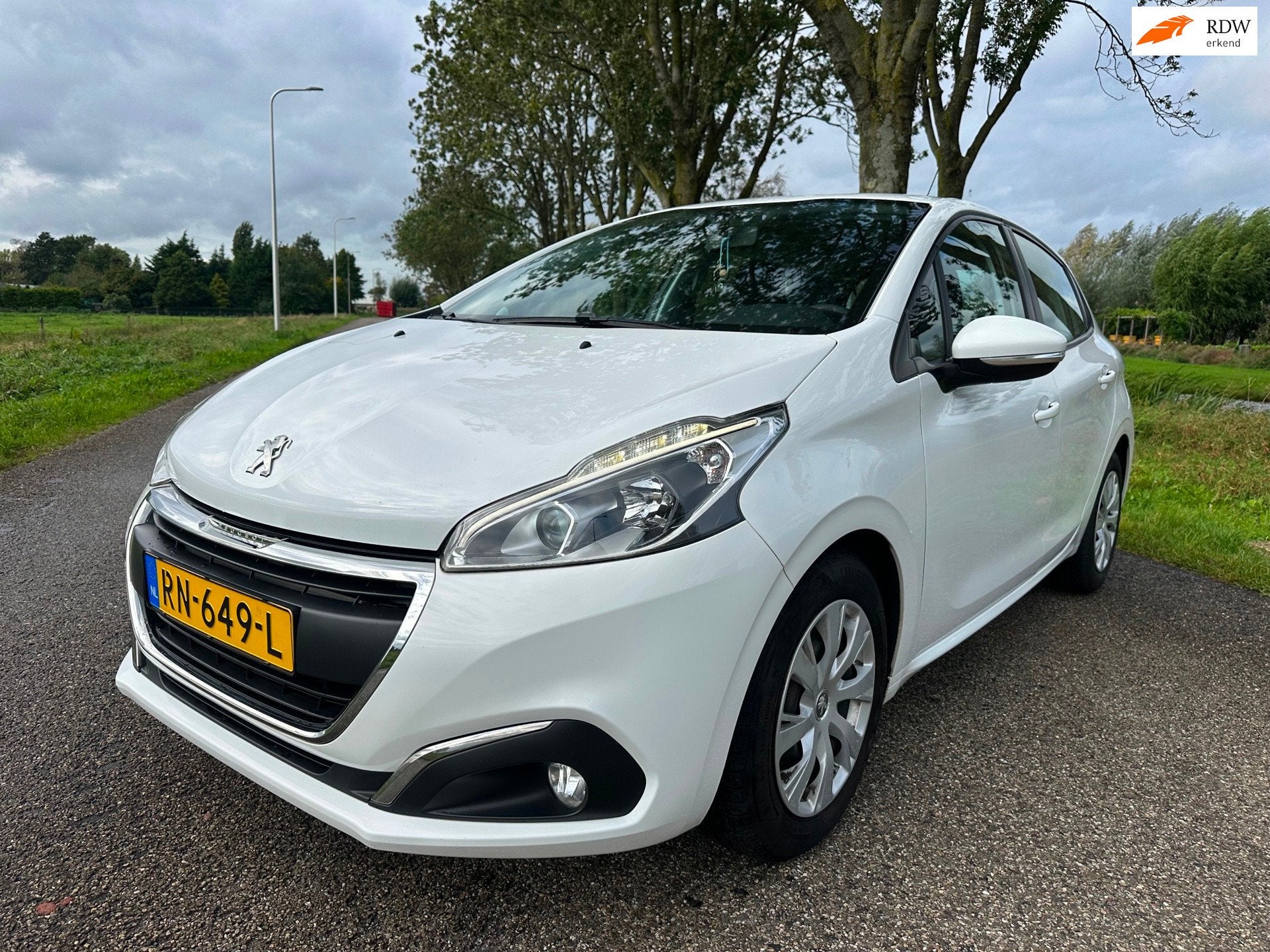 Peugeot 208 1.2 Blue Lion|airco ijskoud|pdc|navi|cruise|nap, Voorwielaandrijving, Stof, Gebruikt, 1199 cc