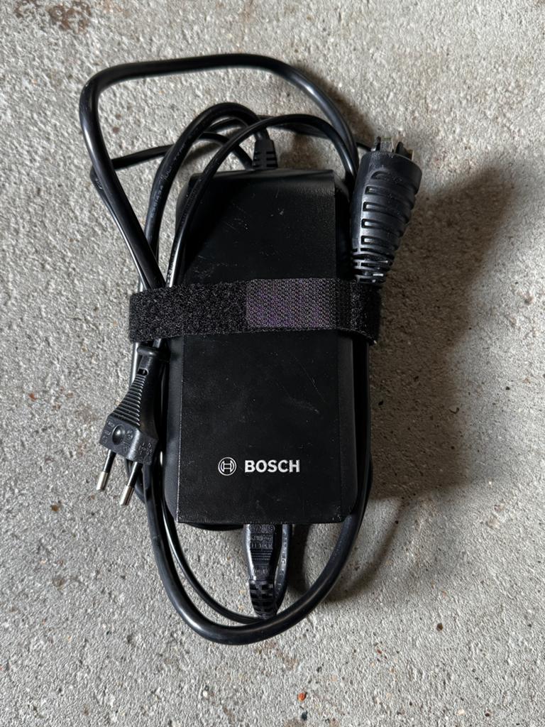 Bosch oplader voor fietsaccu 36V / 2A, Ophalen of Verzenden, Zo goed als nieuw