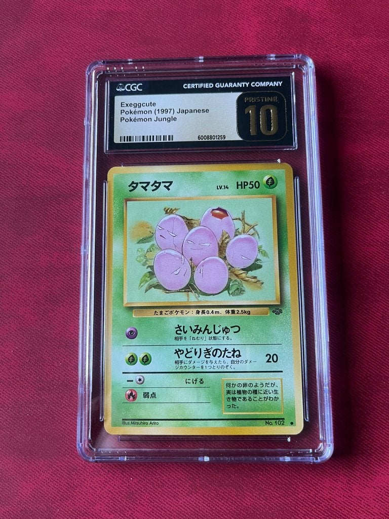 CGC PRISTINE 10 1997 EXEGGCUTE JUNGLE Japanese No.102, Hobby en Vrije tijd, Verzamelkaartspellen | Pokémon, Ophalen of Verzenden