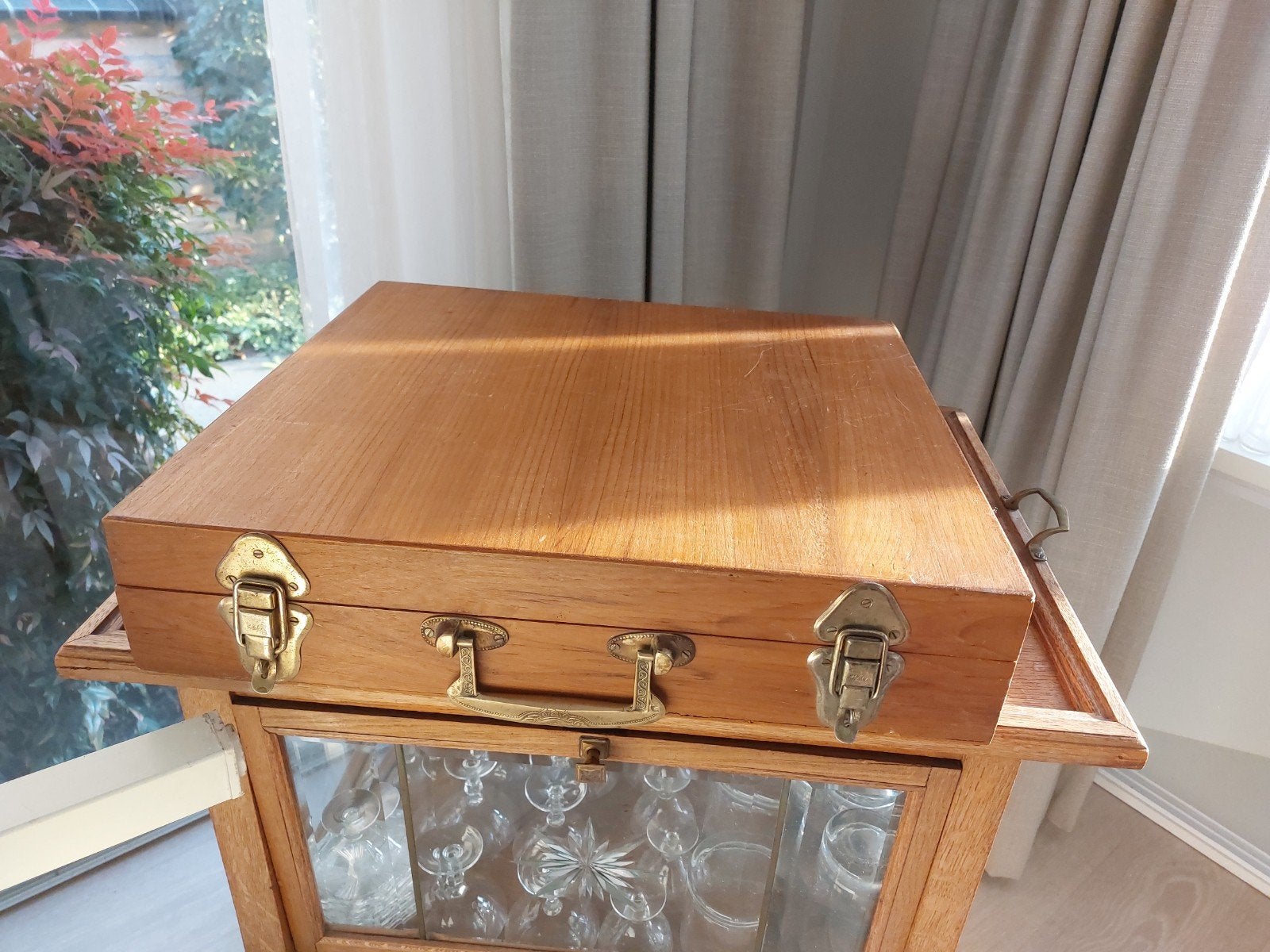 koperen bestek in houten kist, Ophalen