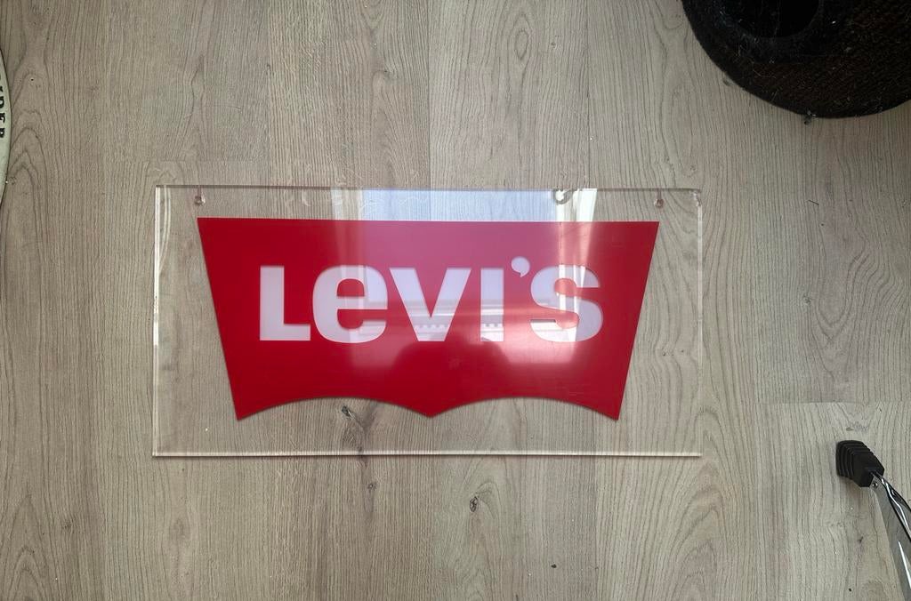 Decoratieve Levi's plaat - Reclamebord, Ophalen of Verzenden, Gebruikt, Reclamebord