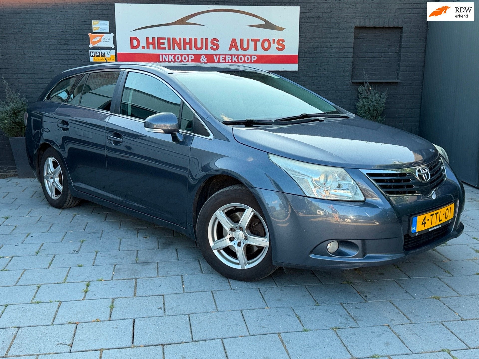 Toyota Avensis Wagon 1.8 VVTi Dynamic 2009, Auto's, Toyota, Zwart, 4 cilinders, Blauw, Handgeschakeld