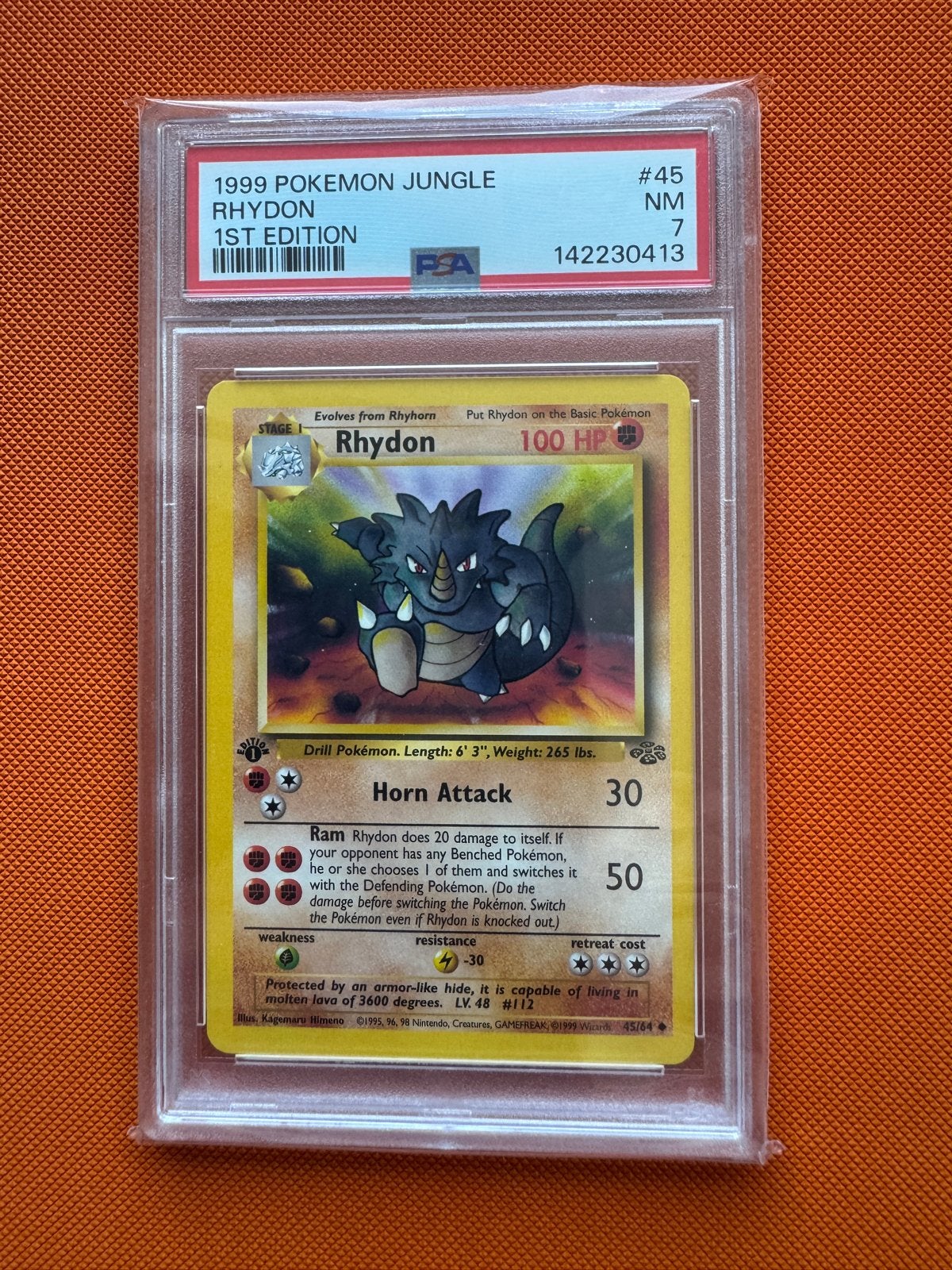 PSA 7 1999 Pokemon Jungle Rhydon 1st Edition, Ophalen of Verzenden, Nieuw, Losse kaart