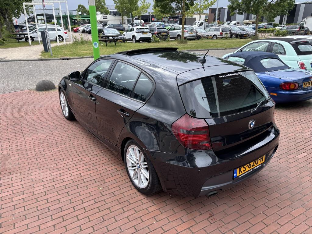 BMW 1-serie 118i High Executive leer navi 6bak elec dak!, Auto's, BMW, 1-Serie, Euro 5, Leder en Stof, Zwart