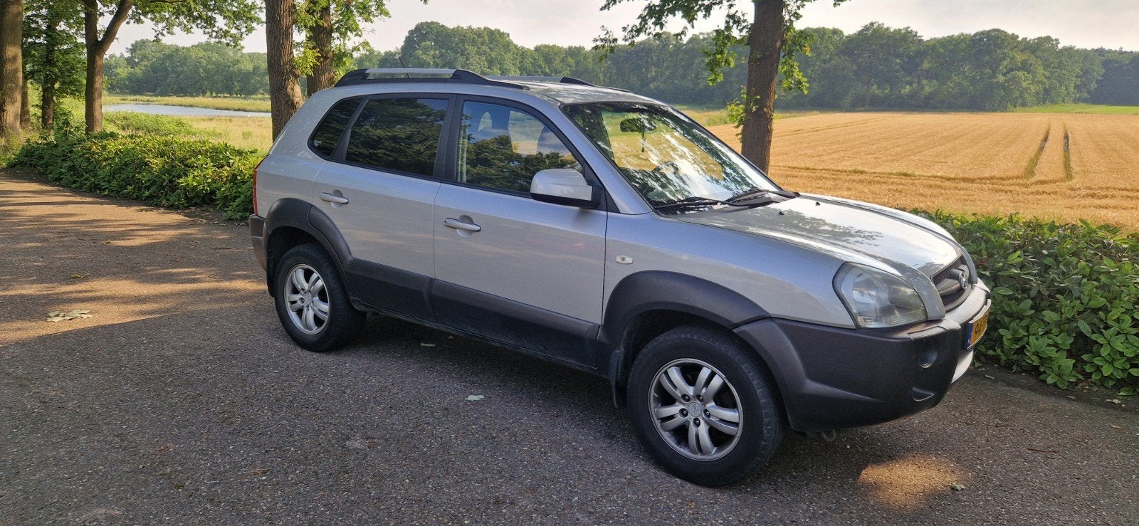 Hyundai Tucson 2.0 I 2WD 2006 Grijs, Zwart, 4 cilinders, Origineel Nederlands, 75 €/maand