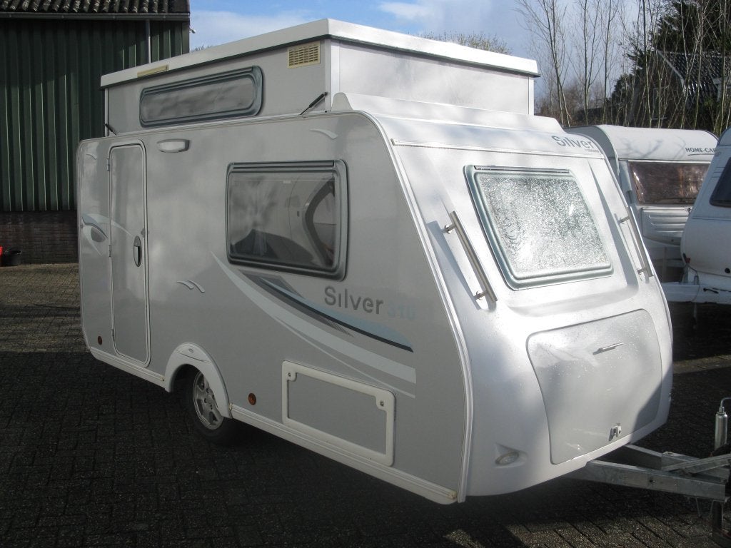Trigano Silver 310 bj 2012 met voortent, Caravans en Kamperen, Overige typen, Trigano, Tot en met 2, Bedrijf