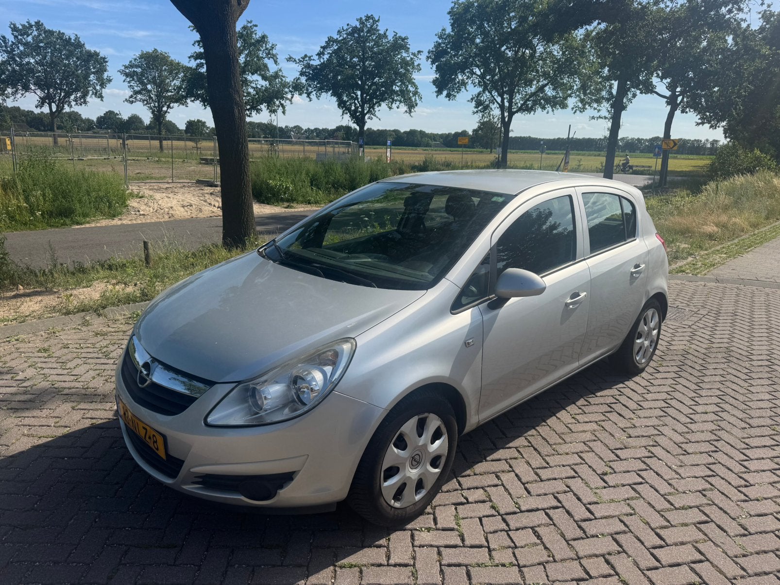 Opel Corsa 1.2 5D 2009 AIRCO/NIEUWE APK, Voorwielaandrijving, Stof, 4 cilinders, Metallic lak