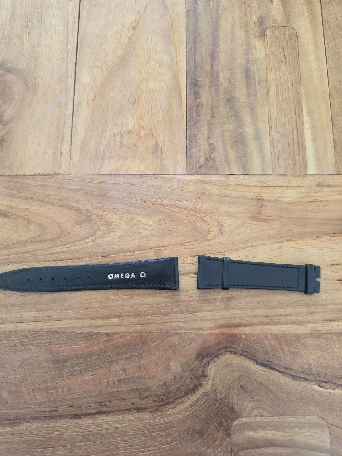 Omega horlogebandje - Zwart leer, Ophalen of Verzenden, Zo goed als nieuw, Omega SA, Rue Stämpfli 96, 2502 Biel/Bienne, Zwitserland