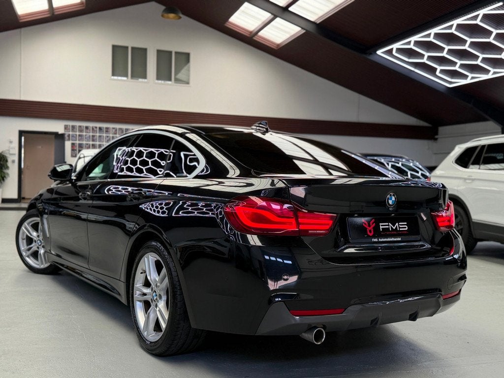 BMW 4-serie Gran Coupé 418i M-Pakket High Executive Edition, Auto's, BMW, Automaat, Gebruikt, Met garantie (alle), Zwart