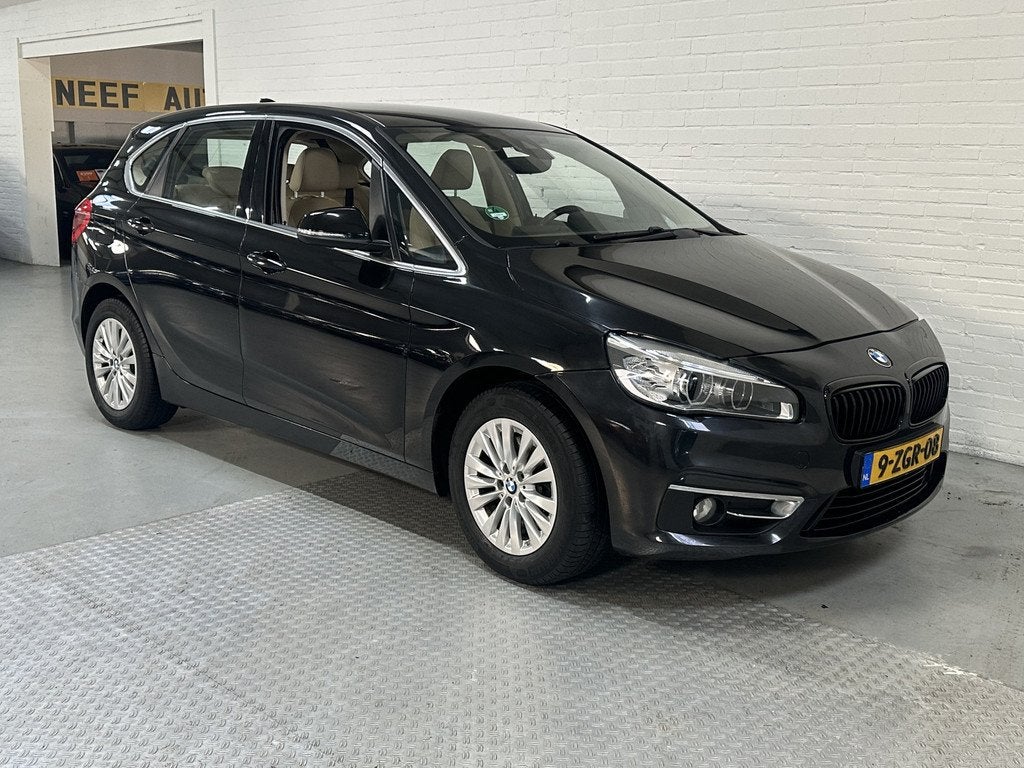 BMW 2 Serie Active Tourer 218i High Executive CLIMA / CRUISE, Voorwielaandrijving, 136 pk, Gebruikt, Zwart