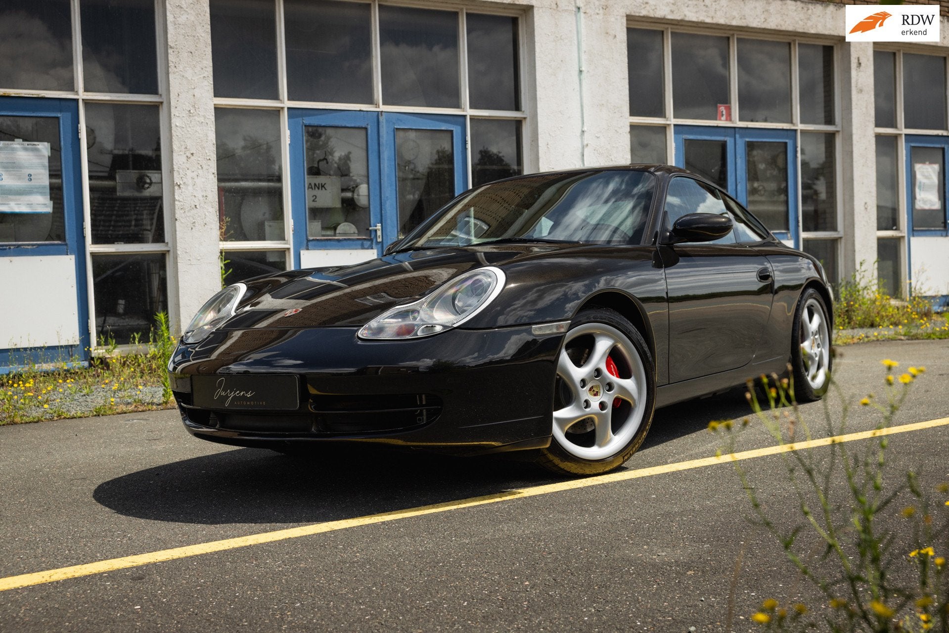 Porsche 911 3.4 Coupé Carrera 4 Manual (300pk) Xenon 18" 10, Auto's, Euro 2, Gebruikt, Zwart, 1350 kg