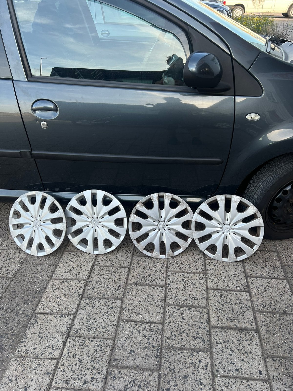 Citroen c1 origineel wieldoppen 14 inch, Auto diversen, Ophalen of Verzenden, Zo goed als nieuw