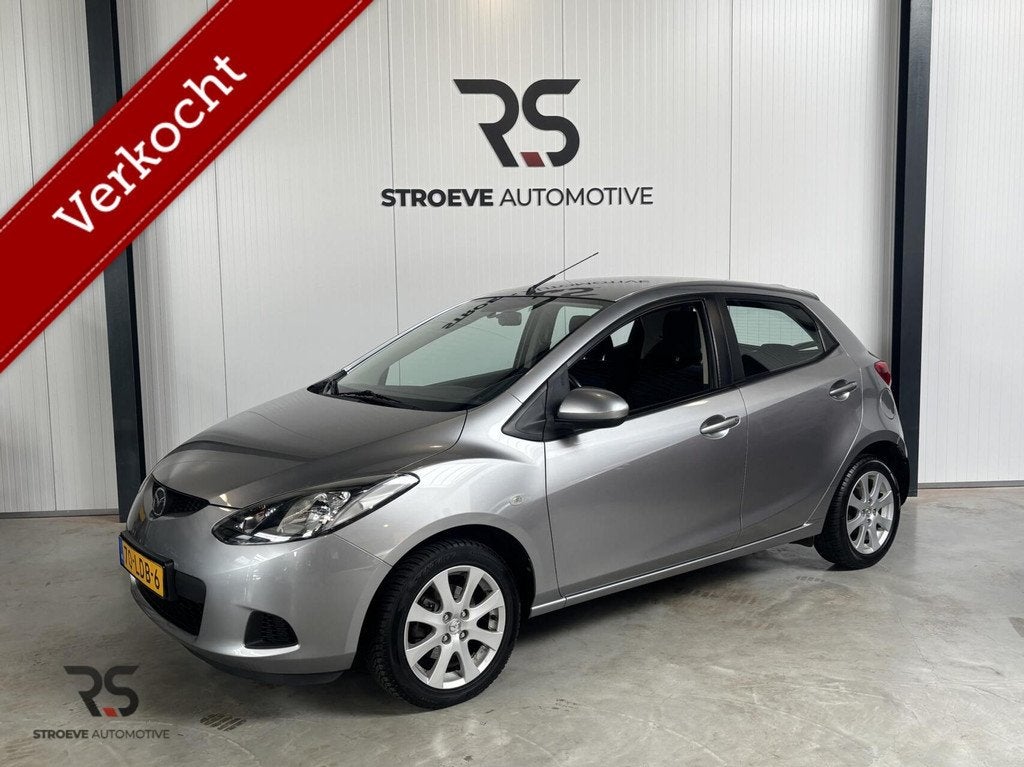 Mazda 2 1.3 TS Plus | Airco | 15" | Radio cd-aux | Leuke aut, Auto's, Voorwielaandrijving, 31 €/maand, 4 cilinders, 4 stoelen