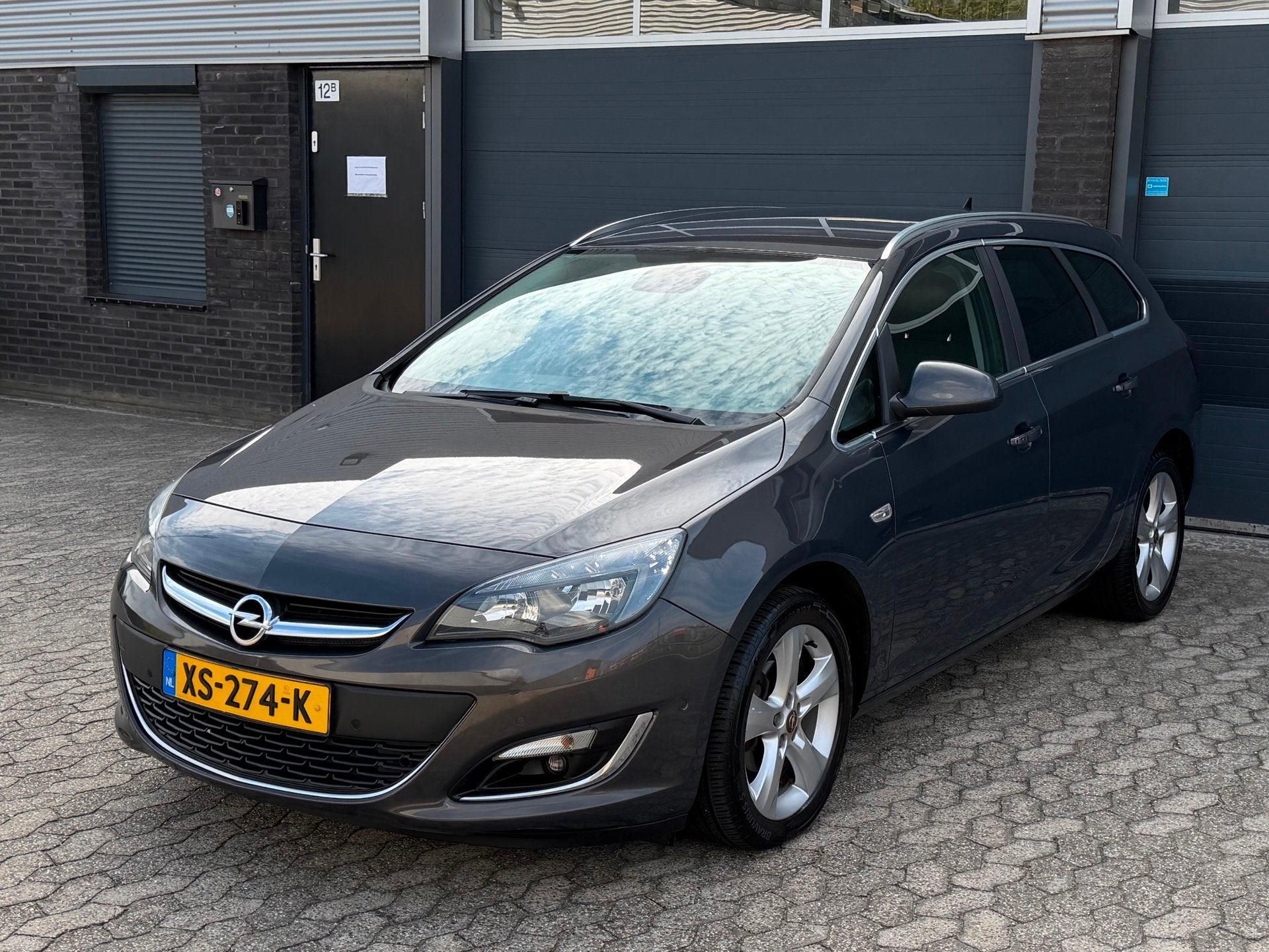 Opel Astra Sports Tourer 1.4 Turbo Sport|NAVI|CAMERA|LEER|CL, Voorwielaandrijving, Euro 5, 15 km/l, Gebruikt