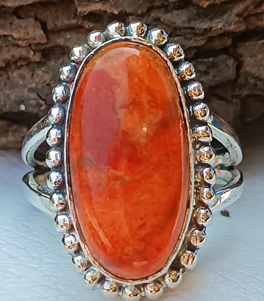 Schitterende zilveren ring met een sponskoraal, Verzenden, 19 tot 20, Nieuw, Oranje