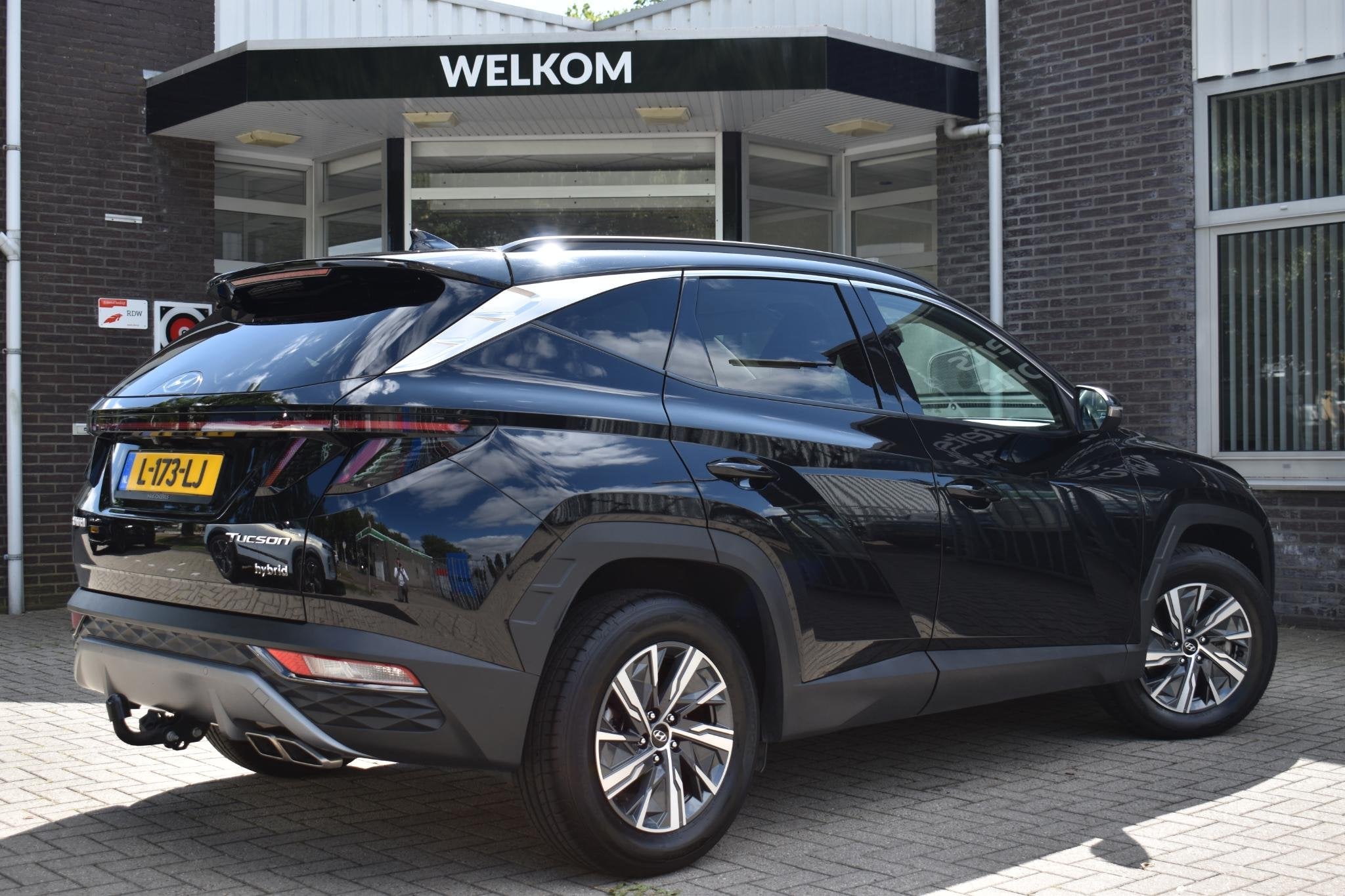 Hyundai Tucson 1.6 T-GDI HEV Comfort | TREKHAAK | CAMERA | N, Auto's, Stof, Gebruikt, Euro 6, 4 cilinders