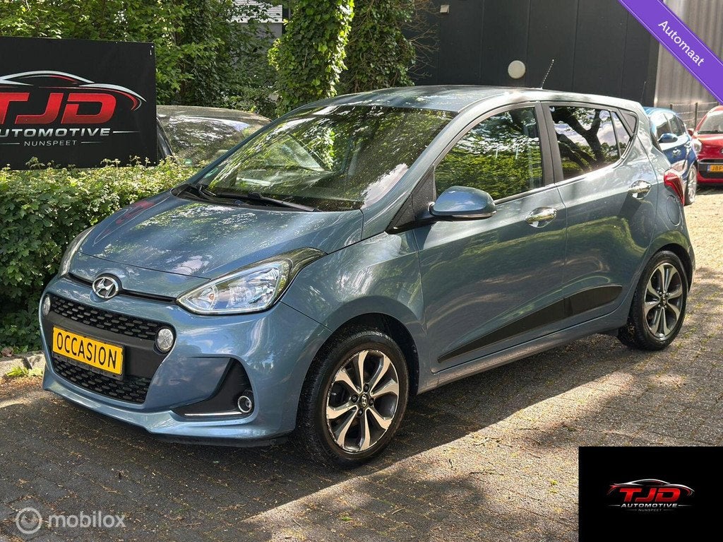 Hyundai I10 1.2i COMFORT-AUTOMAAT-CLIMA-STUURVERWARMING, Auto's, Hyundai, Stof, Gebruikt, Zwart, 4 cilinders