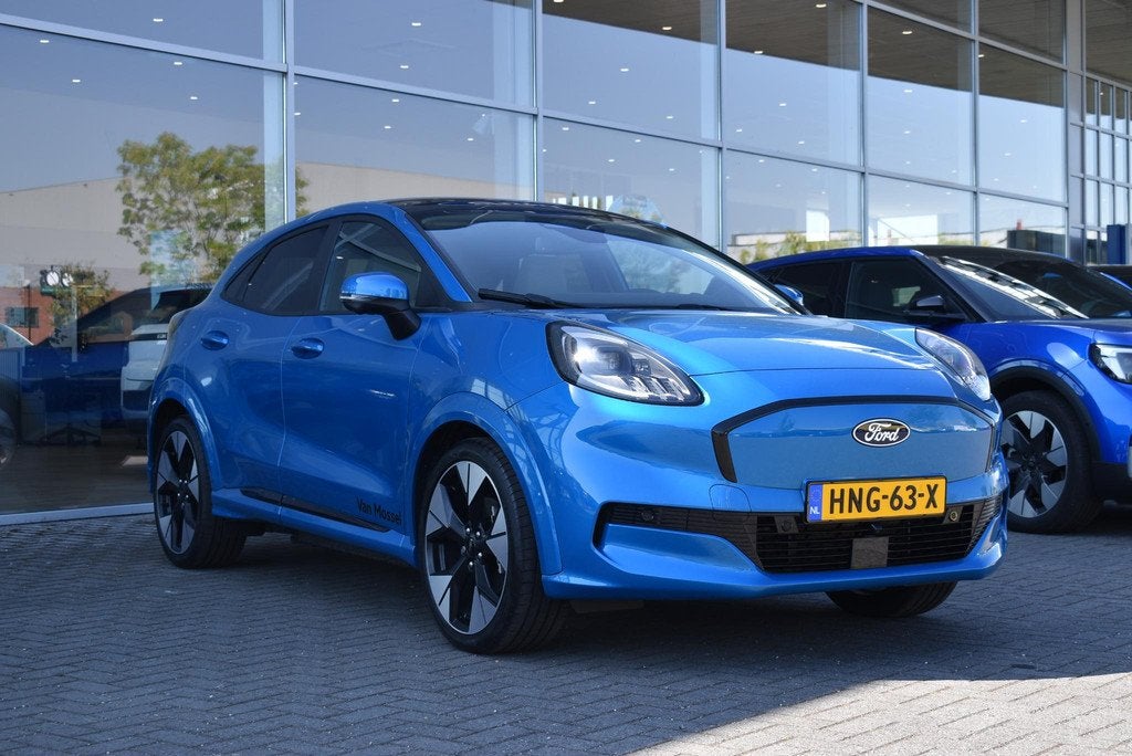 Ford Puma Gen-E Premium 44 kWh | Demo | Digital Aqua Blue |, Stof, 750 kg, 23 min, Blauw
