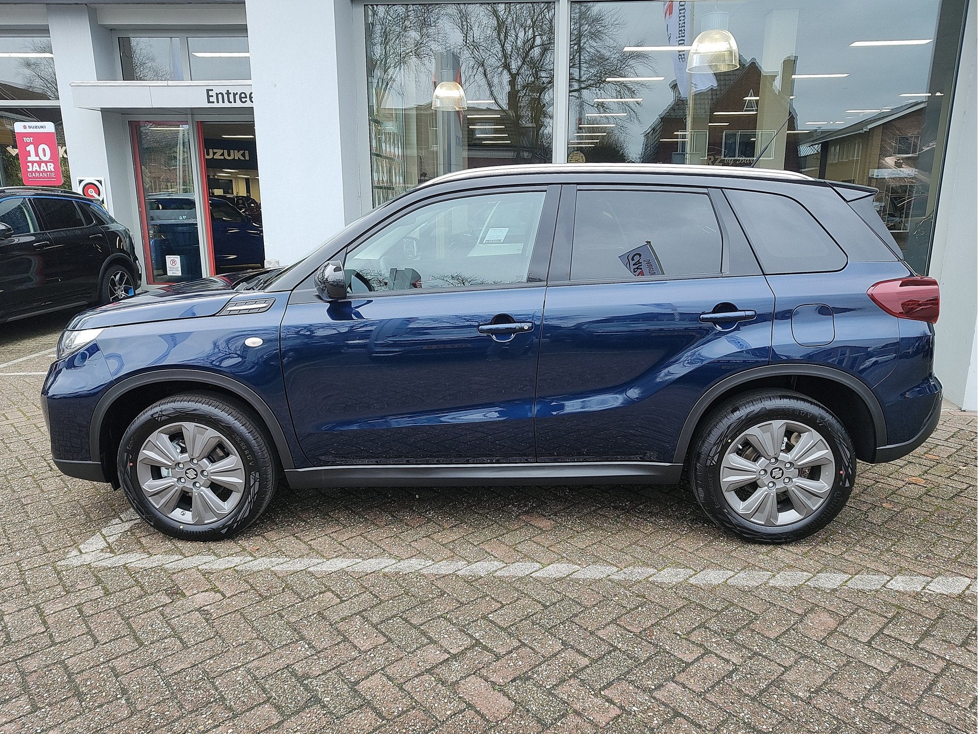 Suzuki Vitara 1.4 BOOSTERJET SELECT SMART HYBRID Direct Leve, Voorwielaandrijving, 12 maanden, Stof, Zwart