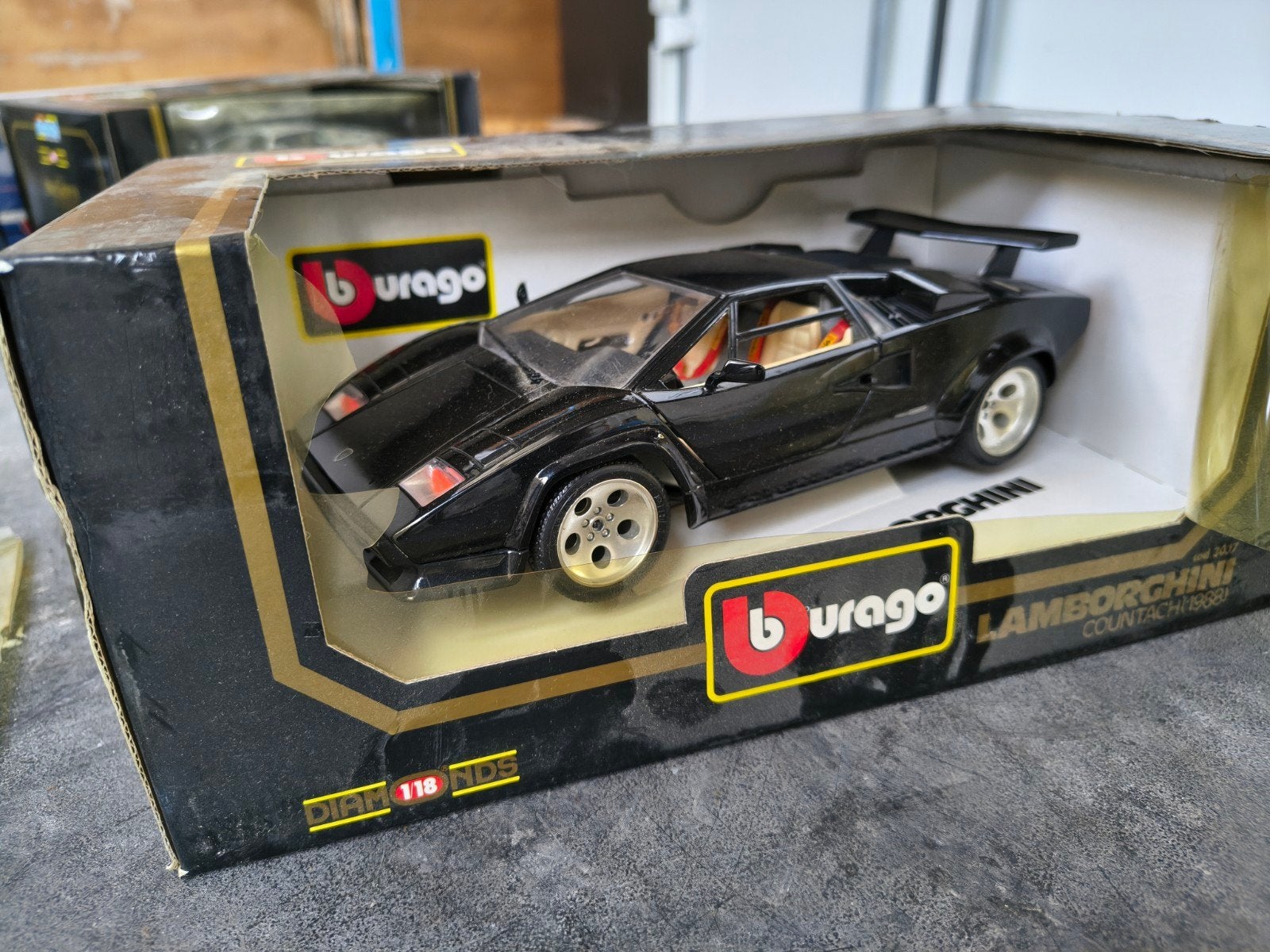 Burago Lamborghini Countach (1988) - Zwart, Ophalen of Verzenden, Bburago