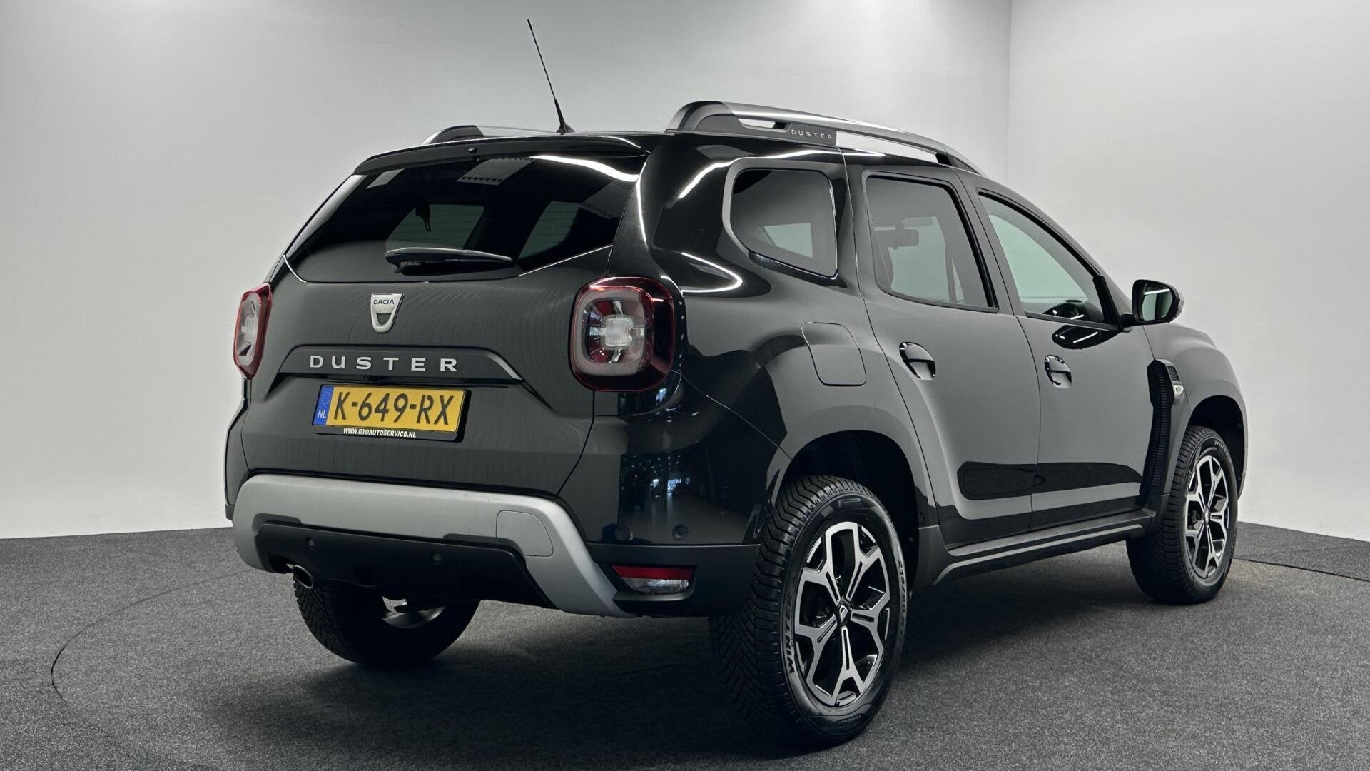 Dacia Duster 1.0 TCe Bi-Fuel Prestige CAMERA LEER NAVI CARPL, Auto's, Voorwielaandrijving, Gebruikt, 4 cilinders, Zwart