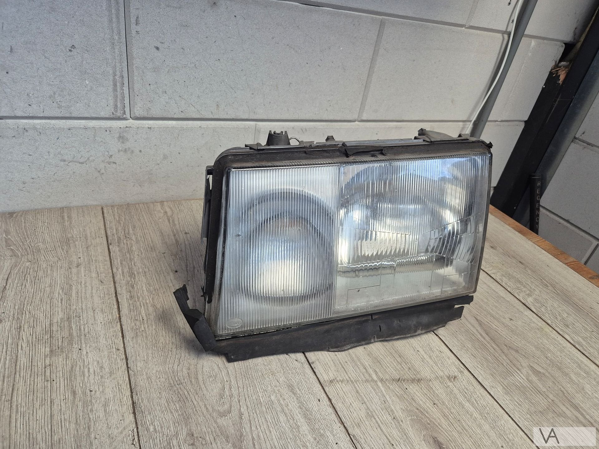 Koplamp links van Mercedes W124 E klasse 1985 - 1995 HELLA, Gebruikt, -, Ophalen of Verzenden, -