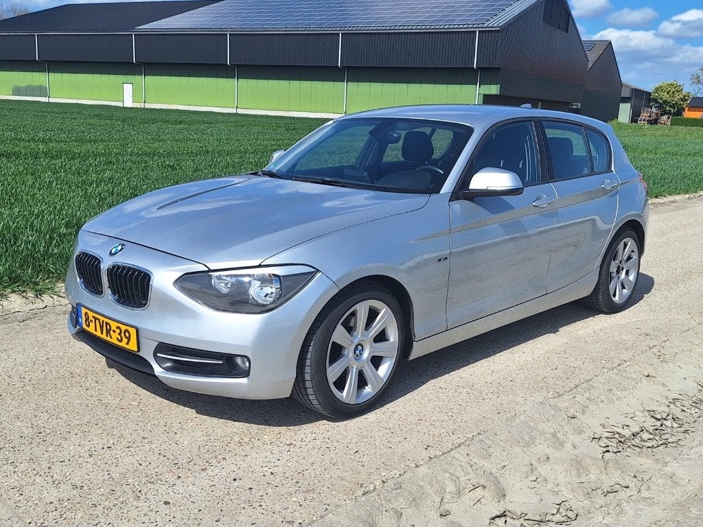 BMW 1-Serie 1.6 116D 2013 Grijs, Auto's, BMW, 1-Serie, Elektrische stoelverstelling, Zwart, 4 cilinders