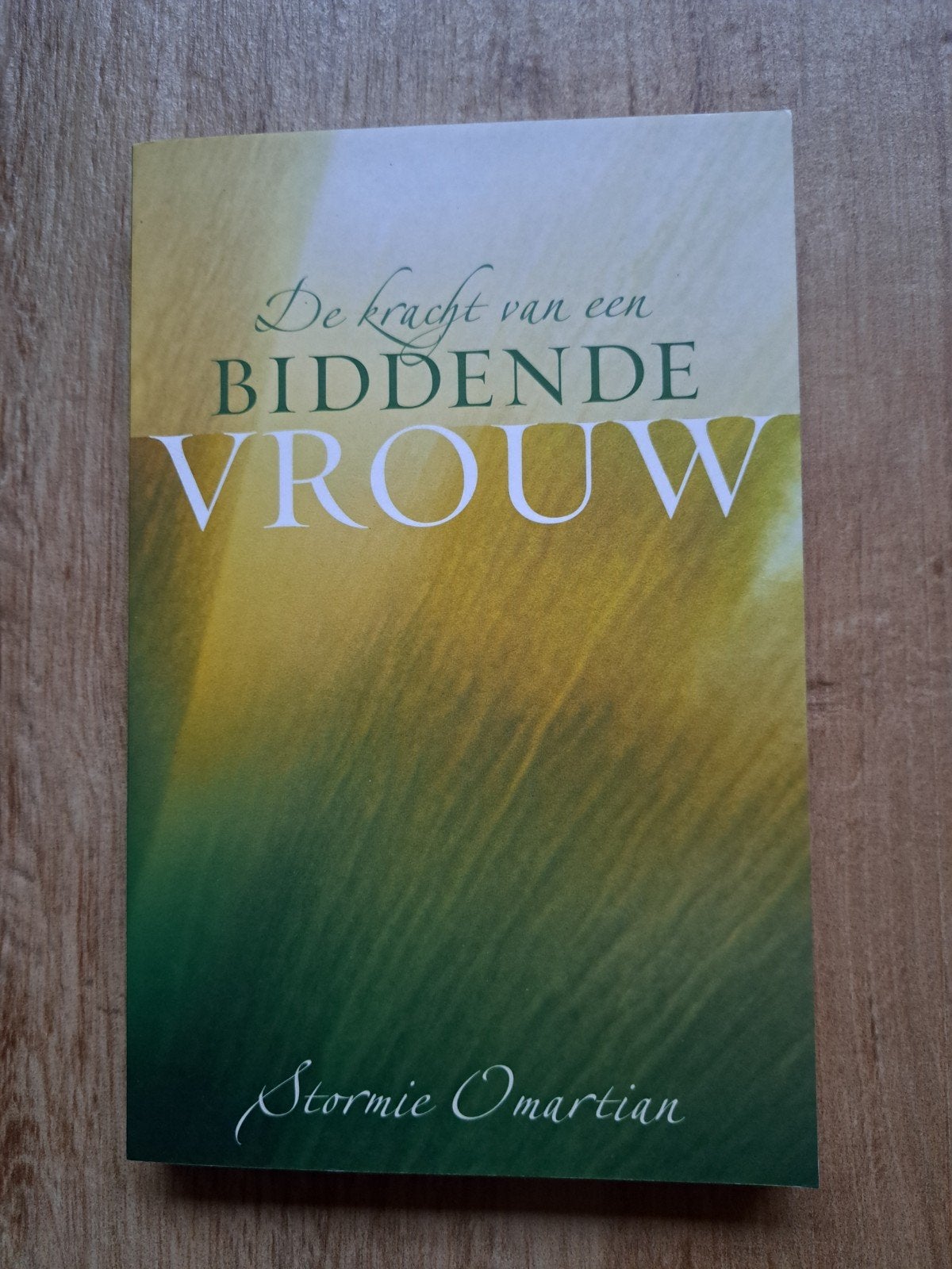 De Kracht van een Biddende Vrouw - Stormie Omartian, Ophalen of Verzenden