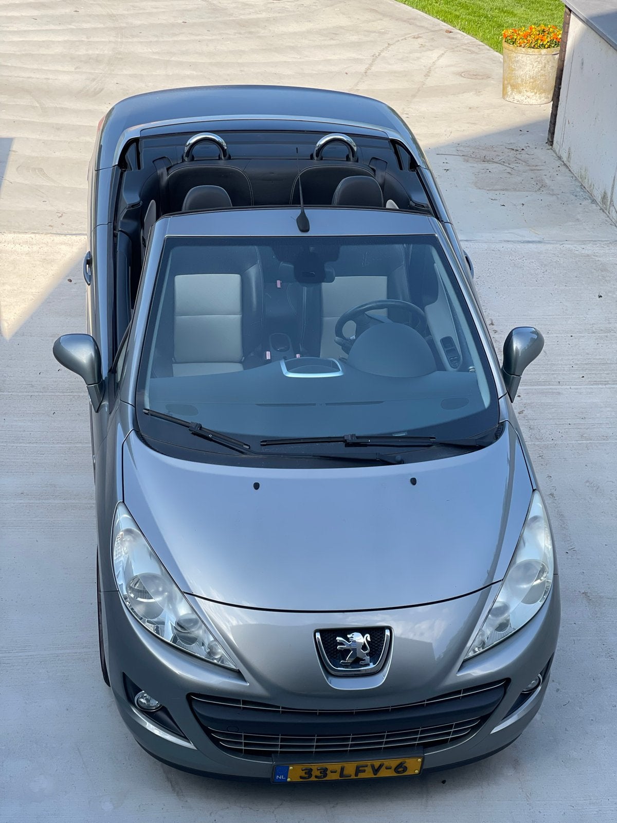 Peugeot 207 Cabrio CC 1.6 VTi Roland Garros 2010 Zilvergrijs, Auto's, Voorwielaandrijving, 15 km/l, 4 cilinders, Cabriolet