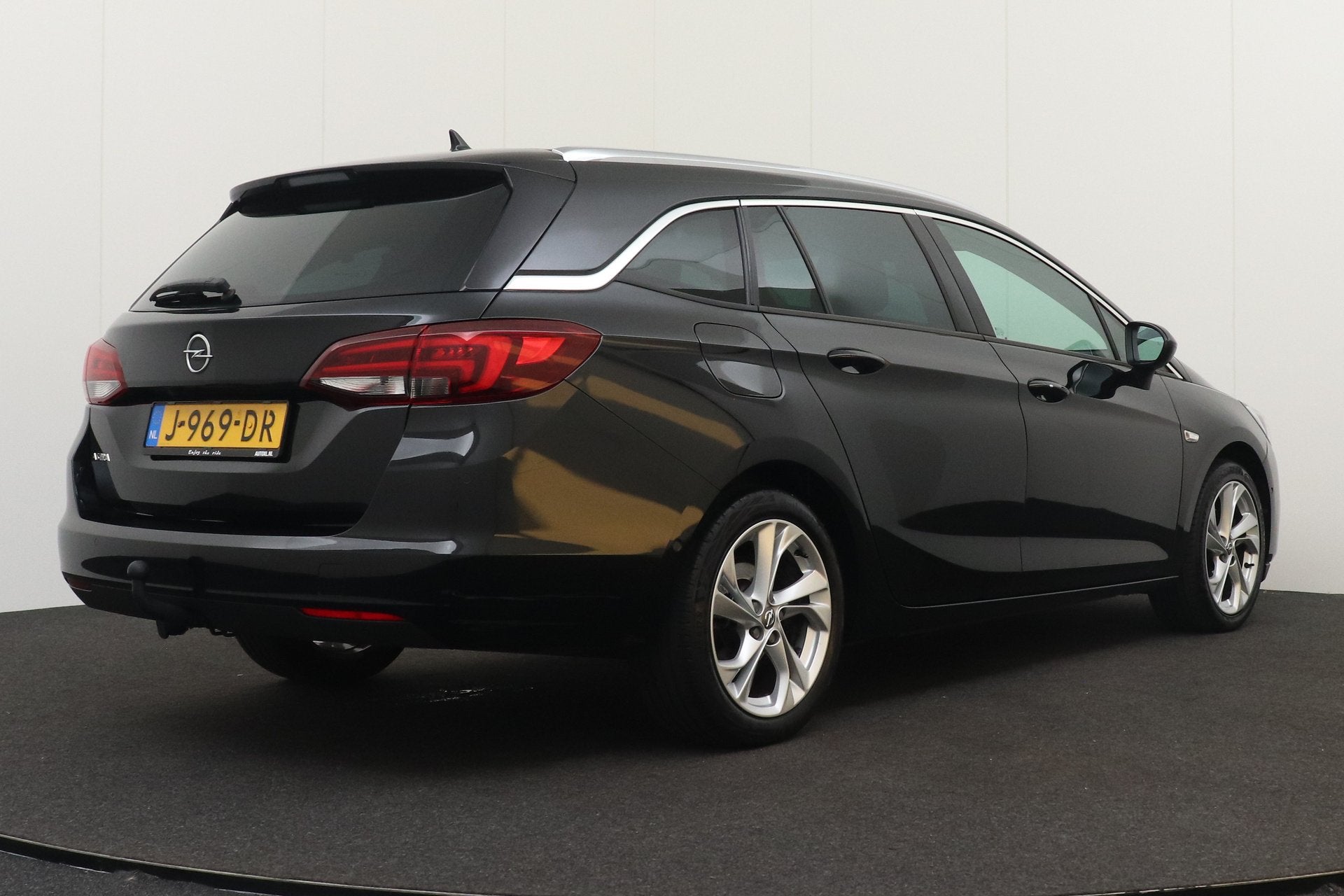 Opel Astra Sports Tourer 1.2 Elegance Trekhaak Carplay Digi., Auto's, Voorwielaandrijving, Dealer onderhouden, 1199 cc, Leder en Stof