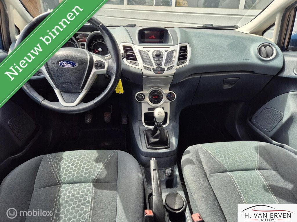 Ford Fiesta 1.25 Titanium CRUISE PDC 79000KM NAP! 2E EIG, Auto's, Ford, Voorwielaandrijving, Euro 5, 1242 cc, 82 pk