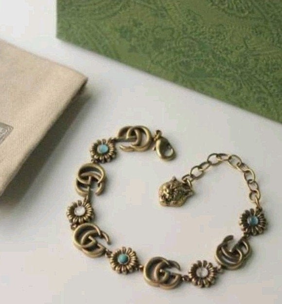 GG armband met bloemdetails, Met kristal, Overige materialen, Ophalen of Verzenden, Zo goed als nieuw