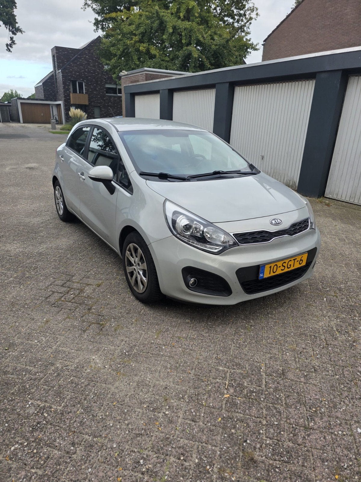 Kia Rio 1.2 I 5DRS 2012 Beige, Auto's, 40 €/maand, 4 cilinders, Beige, Origineel Nederlands