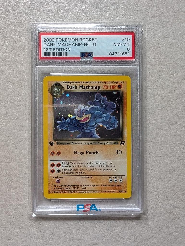 Dark Machamp 1st Edition Holo #10 PSA 8 Pokemon Team Rocket, Ophalen of Verzenden, Zo goed als nieuw, Losse kaart, Foil