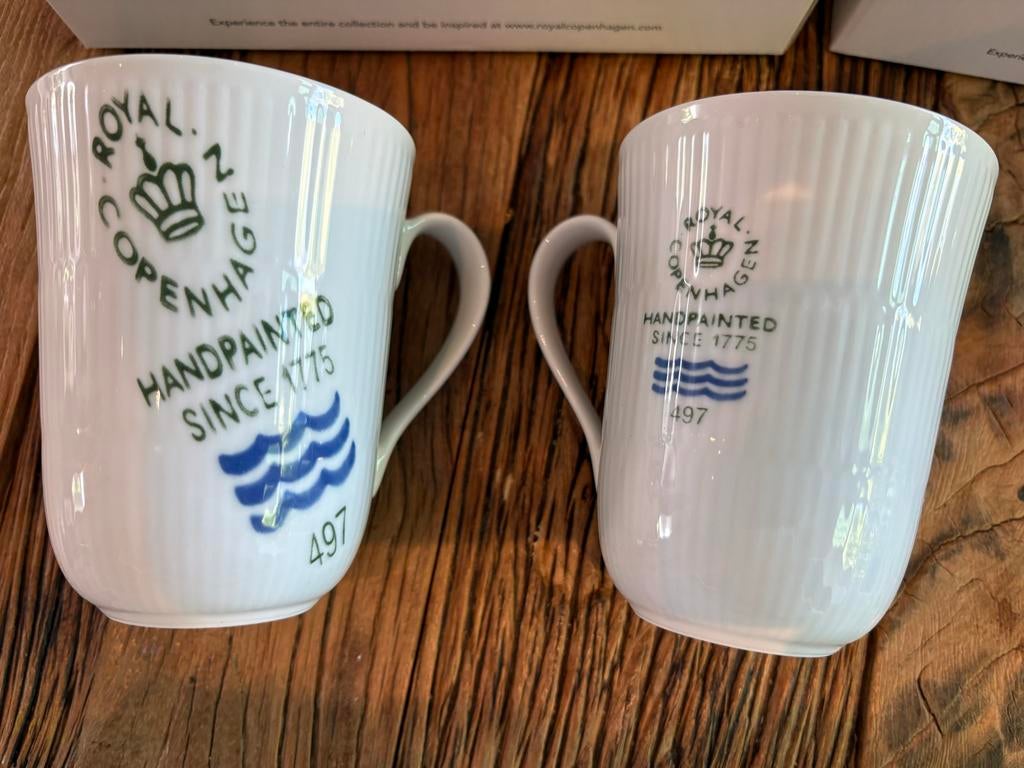 Nieuwe Royal Copenhagen mokken - Set van 2, Huis en Inrichting, Keuken | Servies, Nieuw, Ophalen of Verzenden, Overige stijlen