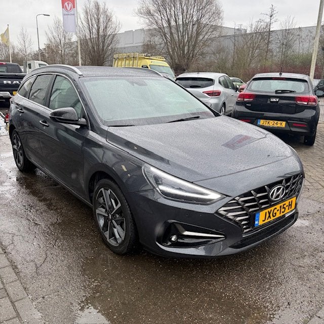 Hyundai I30 Wagon 1.0 T-GDi MHEV VOL OPTIES INCL JAAR BOVAG, Gebruikt, Leder, Stationwagon, Hybride Elektrisch/Benzine