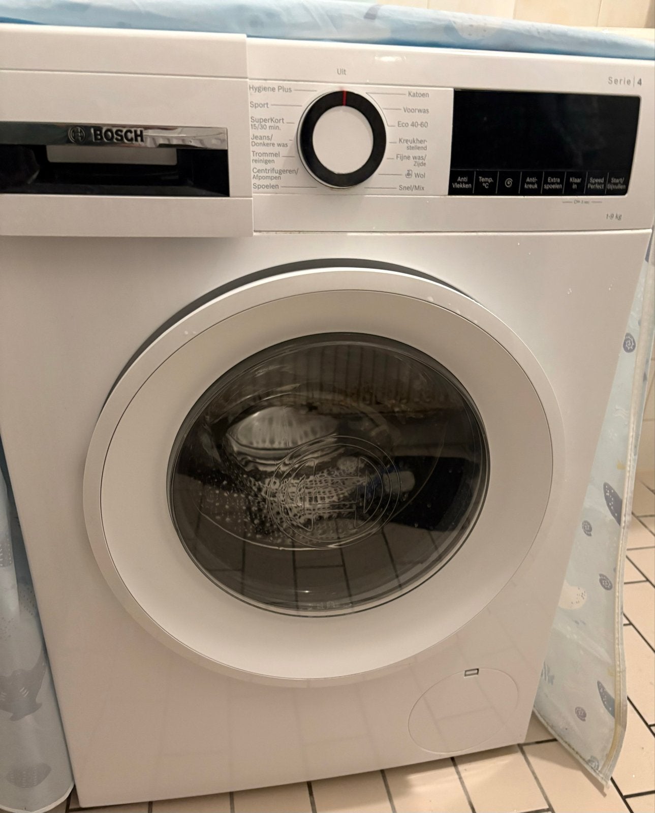 Bosch Serie 4 WGG04407NL/76 wasmachine - Zo goed als nieuw, Ophalen, 1200 tot 1600 toeren, 8 tot 10 kg, Zo goed als nieuw