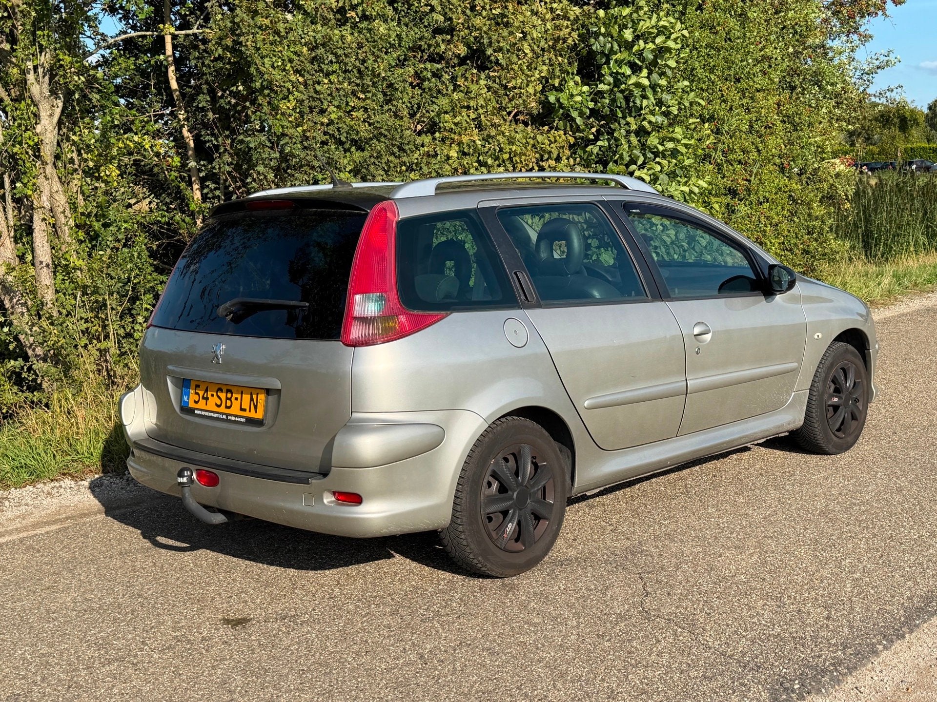 Peugeot 206 SW 1.6-16V Griffe APK 03-2027 NAP Leder NAP, Auto's, Peugeot, Voorwielaandrijving, 15 km/l, Gebruikt, Zwart