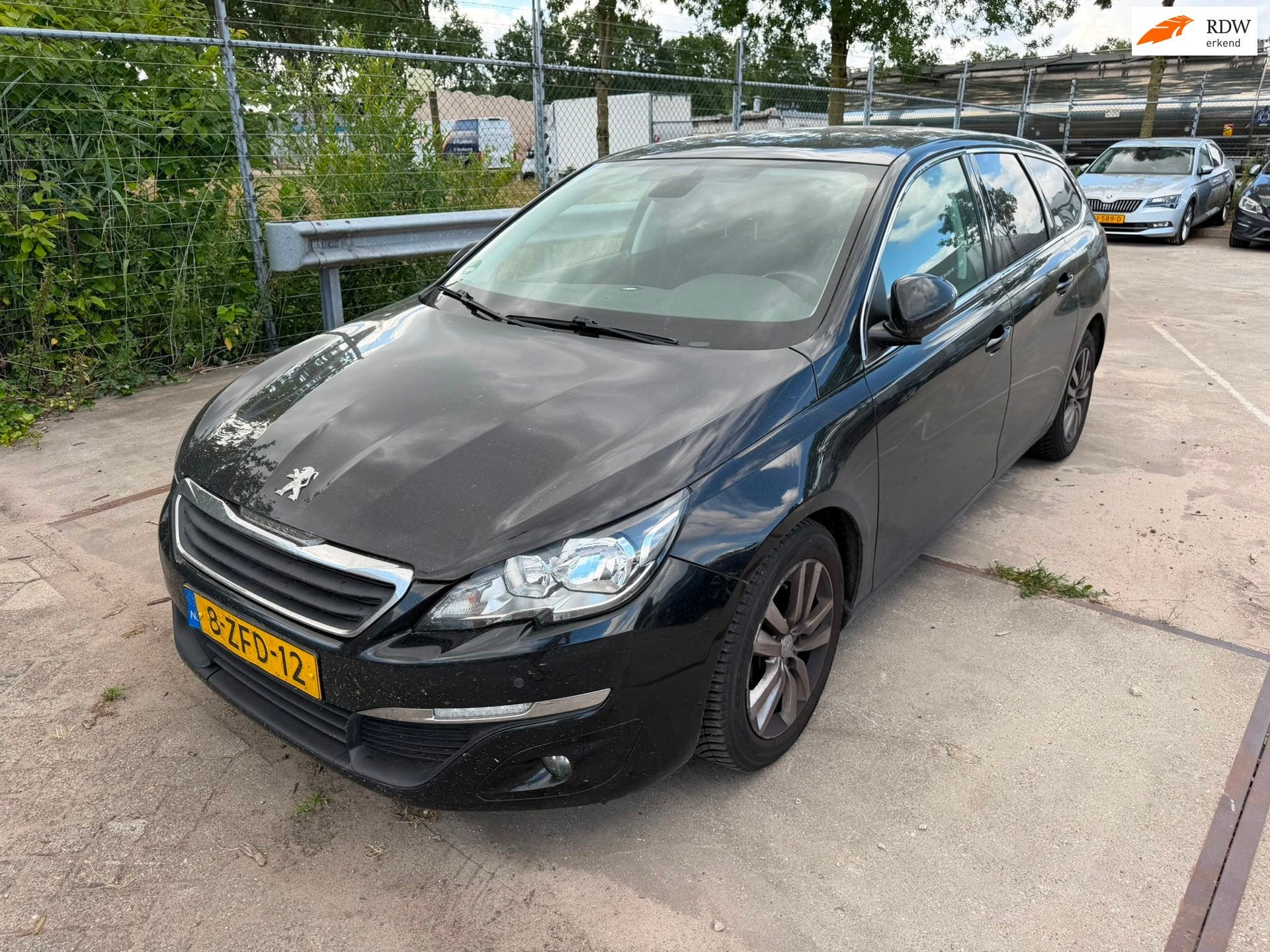 Peugeot 308 SW 1.6 BlueHDI Blue Lease Limited, Auto's, Voorwielaandrijving, Gebruikt, 4 cilinders, Zwart