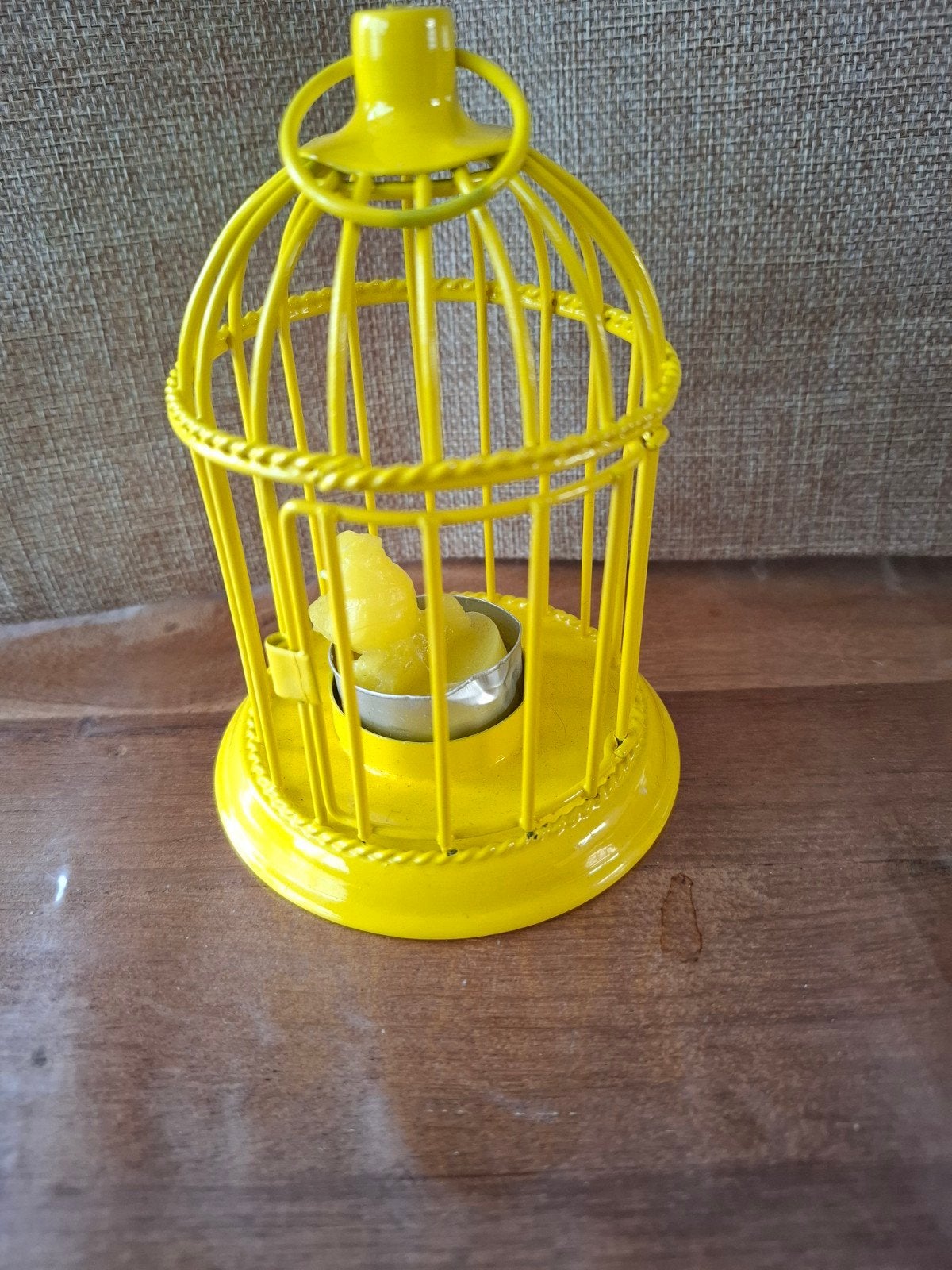 Vogel kaarsje in kooi, Ophalen