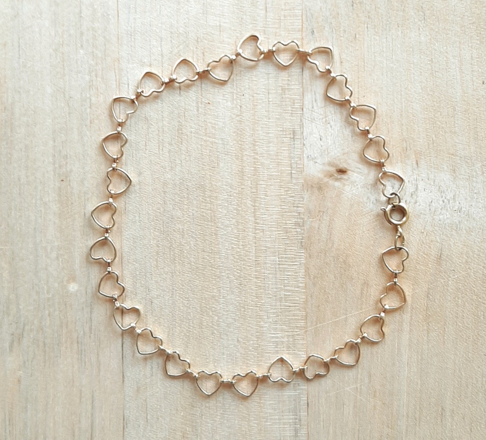 goudkleurig hartjes enkelbandje, Sieraden, Tassen en Uiterlijk, Enkelbandjes en Enkelkettinkjes, Ophalen of Verzenden, Gebruikt